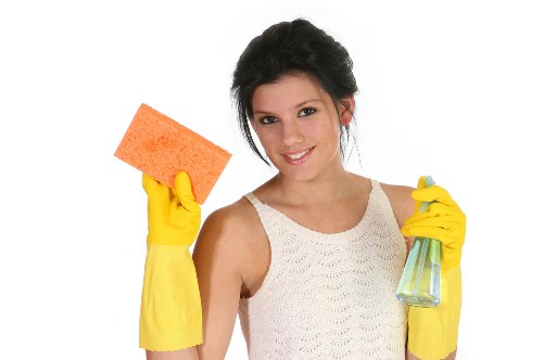 Professional carpets cleaner in Bromley cleaning a living room carpet