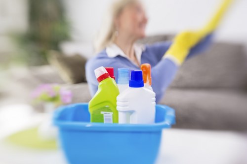 Cleaning staff reviewing safety procedures and product handling guidance