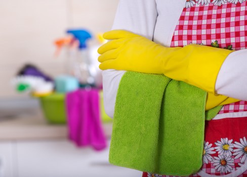 Cleaning team working responsibly with safety-focused procedures